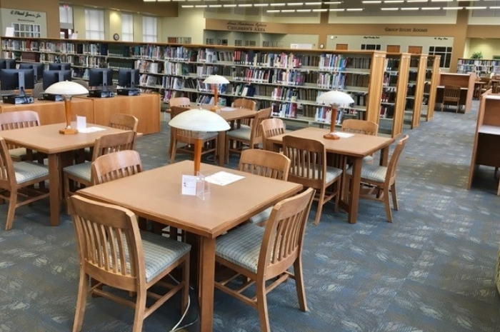 Inside space of the library with tables