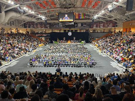 Photo of students and guest in the Gymnasium for graduation