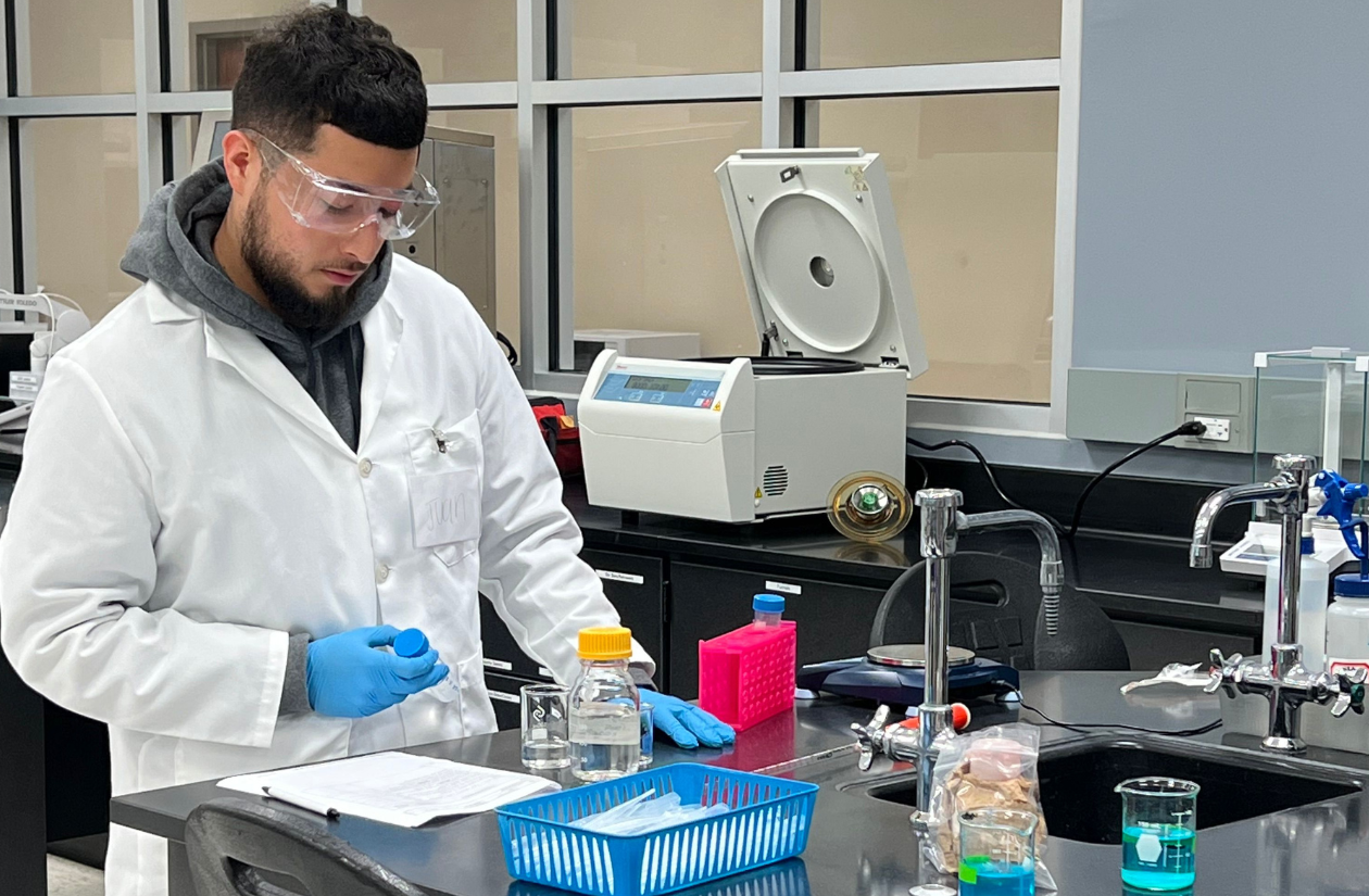 Photo of Male Student in the Science Lab